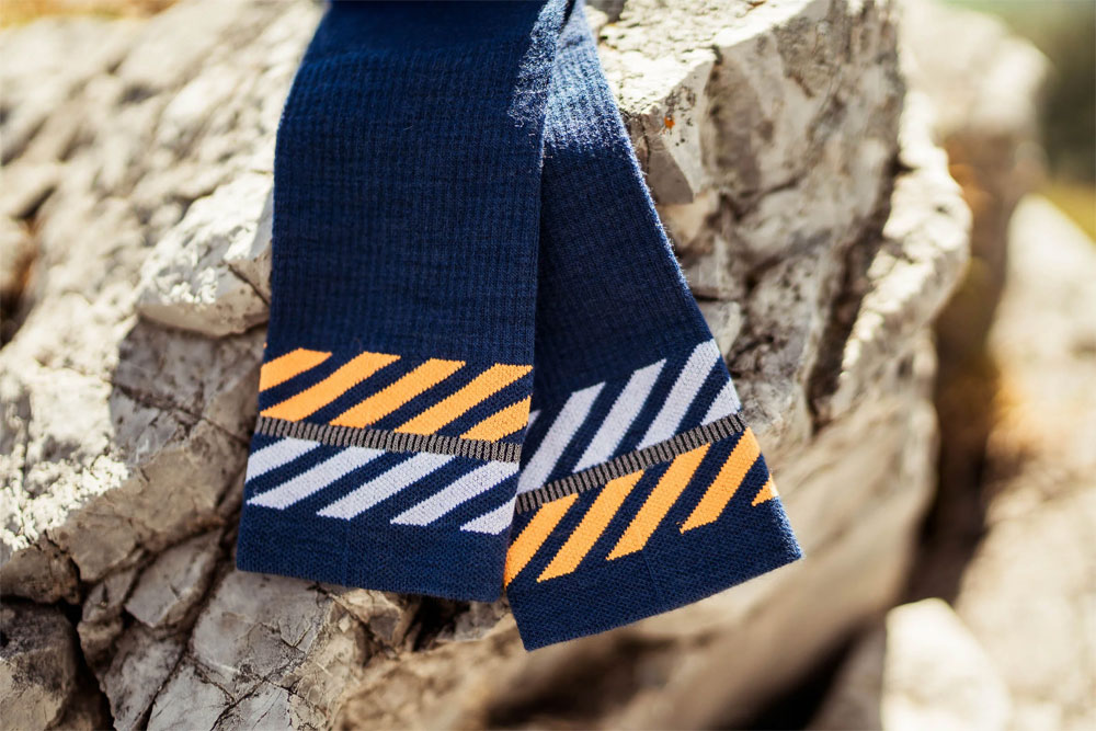 incylence-hiking-socks-merino-light-high-cut-lanes-navy-orange-3.jpg